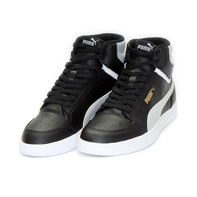 black and white leather pumas