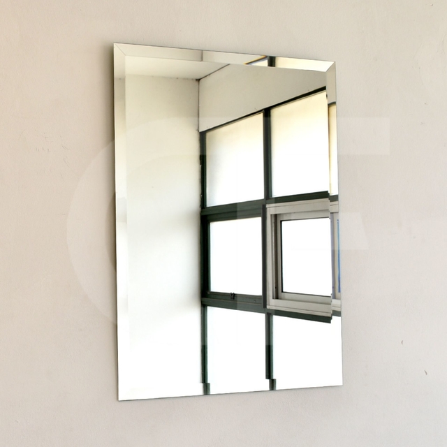 Espejo rectangular biselado Medida final 0.60M x 0.40M. Ideal baño
