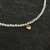 The mini love pearl choker en internet