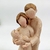 Enfeite de Família Decoração Moderna 15cm em Resina Casal com Bebê na internet
