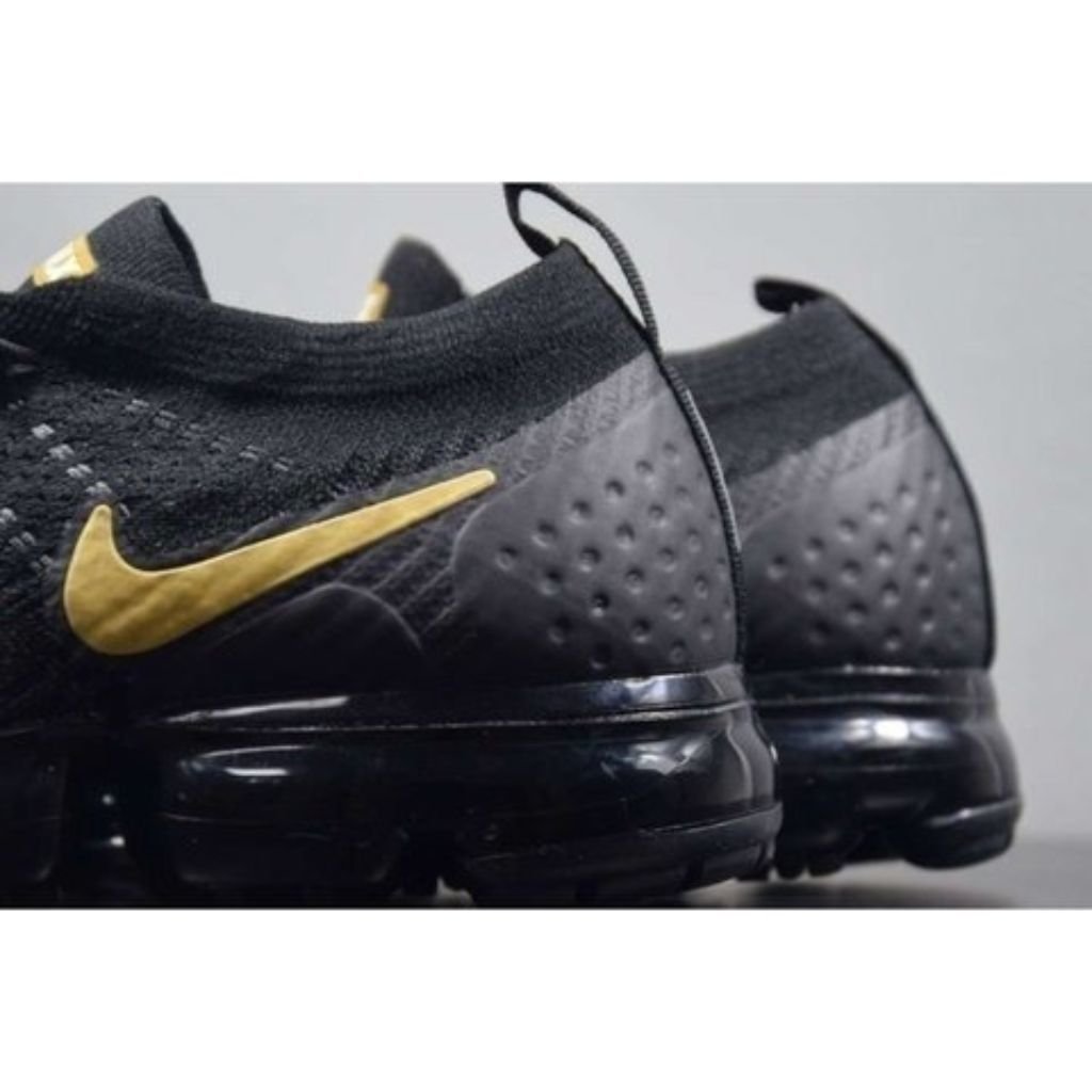 nike simbolo dourado