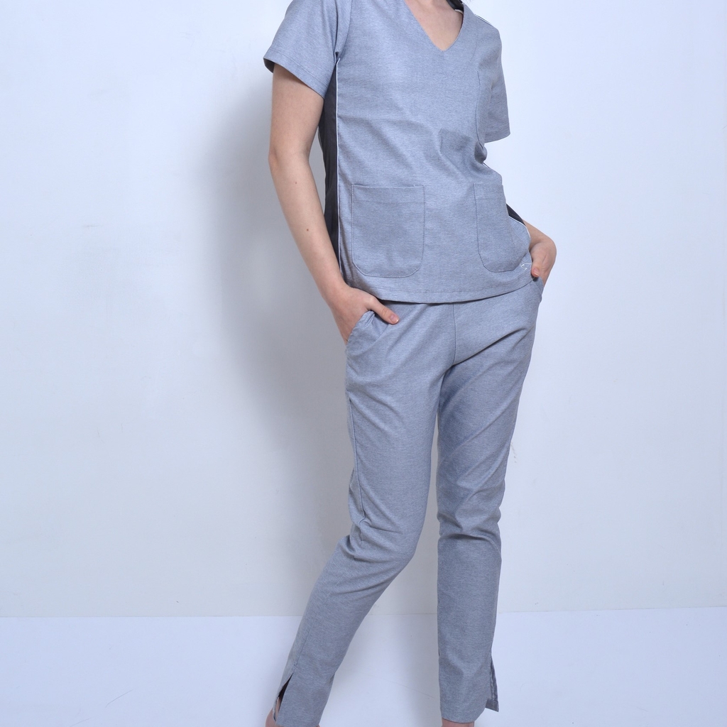 Pantalón elastizado mujer chupin tajo GRIS CLARO