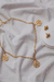 KIT Colar Dourado Pentagrama + Brinco Caveira Dourada - comprar online