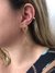 Piercing fake de zircônia banhado em ouro 18k na internet