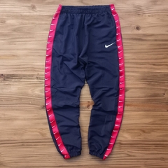 PANTALON ROMPEVIENTO NIKE AZUL - Comprar en Farnistore