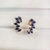 Brinco Ear cuff com pedras de zircônia em formato de navetes na cor azul marinho folheado em ouro 18k