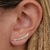 Brinco Ear cuff com fileira de micro zircônias cravejadas cor cristal folheado em ouro 18k