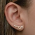 Brinco Ear Cuff estrelas lisas e com zirconias cor cristal folheada em ouro 18k