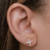 Kit 3 produtos com brinco ear cuff estrela de 4 pontas brinco ponto de luz e piercing falso de pressão folheados em ouro 18k - loja online