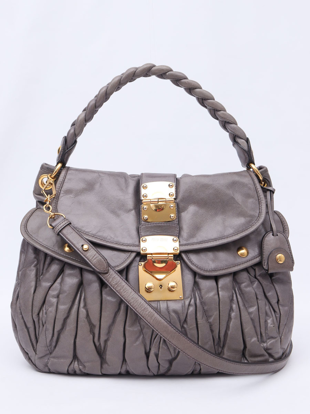 miu miu matelasse top handle bolsa