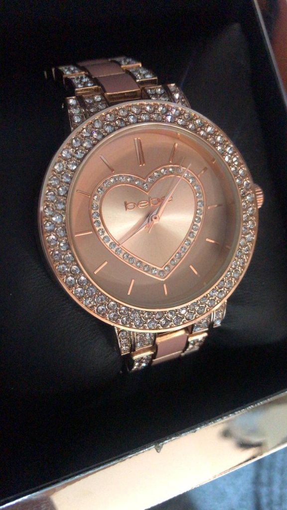 Reloj de mujer , importado con brillos color oro rosado