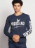 REMERA BROSS LONDON M/L ESTAMPA FTE Y MGA