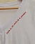 Remera Blanca Confiar con rojo - YAMBANI