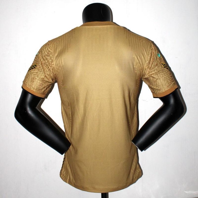 camisa nike dourada