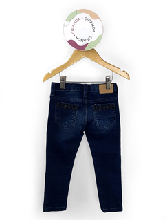 Calça jeans com elastano - modelo skinny - lavagem escura com aplicação de brilho nos contornos dos bolsos frontais Zara Girls Tam 3/4 Como novo - comprar online