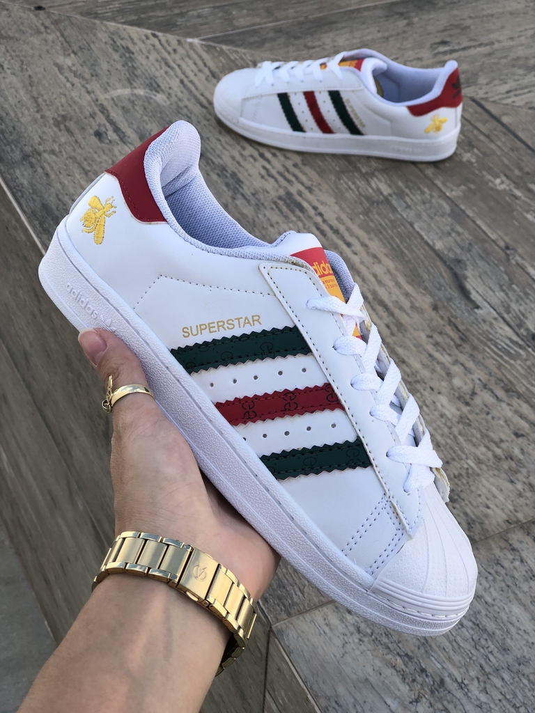 tenis adidas com gucci