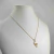 Colar Love com cruz cravejada - comprar online