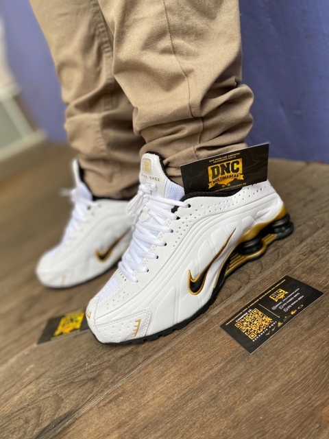 nike shox 4 mola dourado