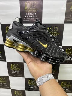 nike shox tl preto e dourado