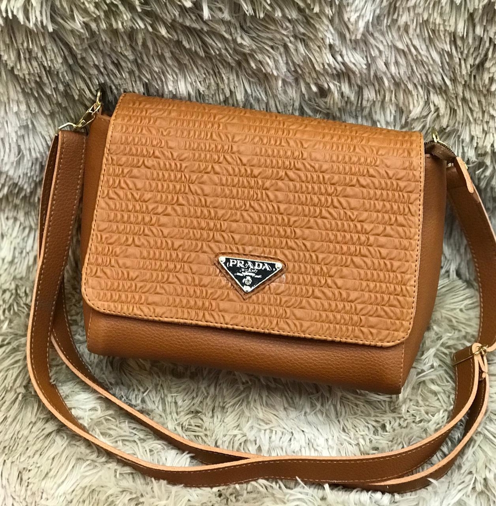 brown merchandise bolsas