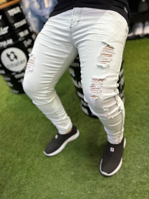 14956.103 - Calça Titular Jeans Off White Rasg