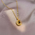 Collar de proyección - Acero de Titanio - Luna dorada - tienda online