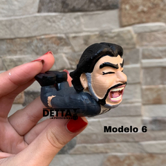 Figura de Maradona festejo