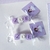 Souvenirs jabones 3 letras en bolsita (nena, lila floral) - comprar online