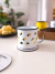 caneca adênia em vertigem - comprar online