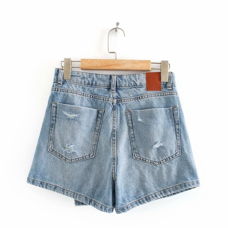 short tipo saia jeans