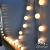 Guirnalda tipo Kermesse Led Blanco Calido 9mts / 100 luces 100 pelotitas en internet