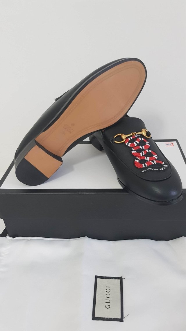 gucci mules with snake
