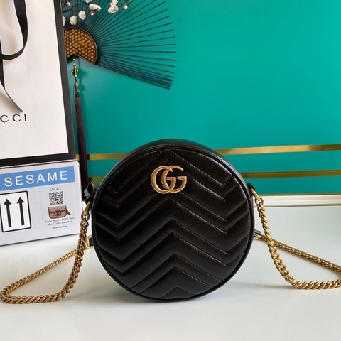 black round gucci bolsa