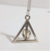 Collar Harry Potter - Reliquias de la muerte con centro giratorio - Producto oficial - tienda online