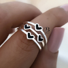 AN 042- Anillo corazones negros (ACERO BLANCO)