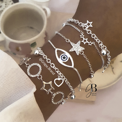 PU 391 - Pulsera estrellas caladas (ACERO BLANCO) - Grape Brand