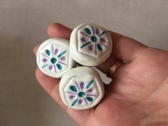 Tirador porcelana