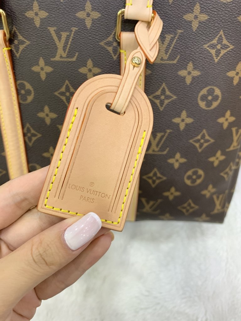 louis vuitton bolsa tag