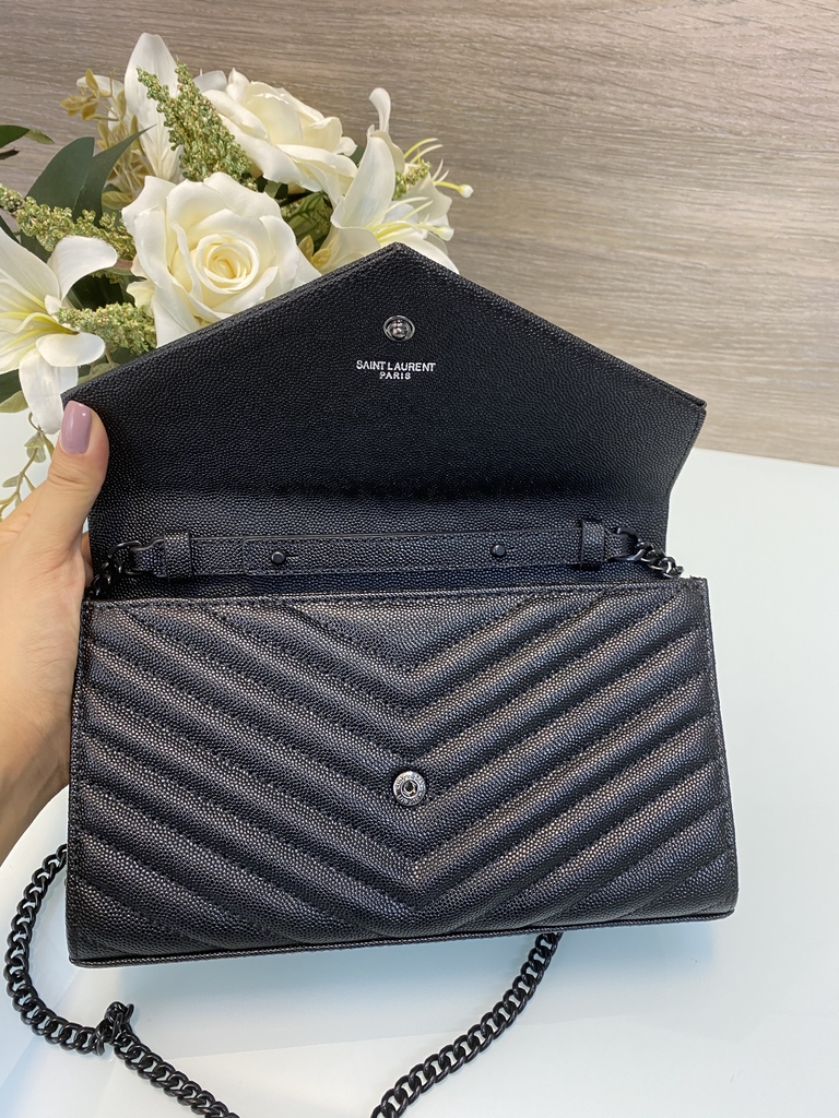 do saint laurent bolsas have serial numbers