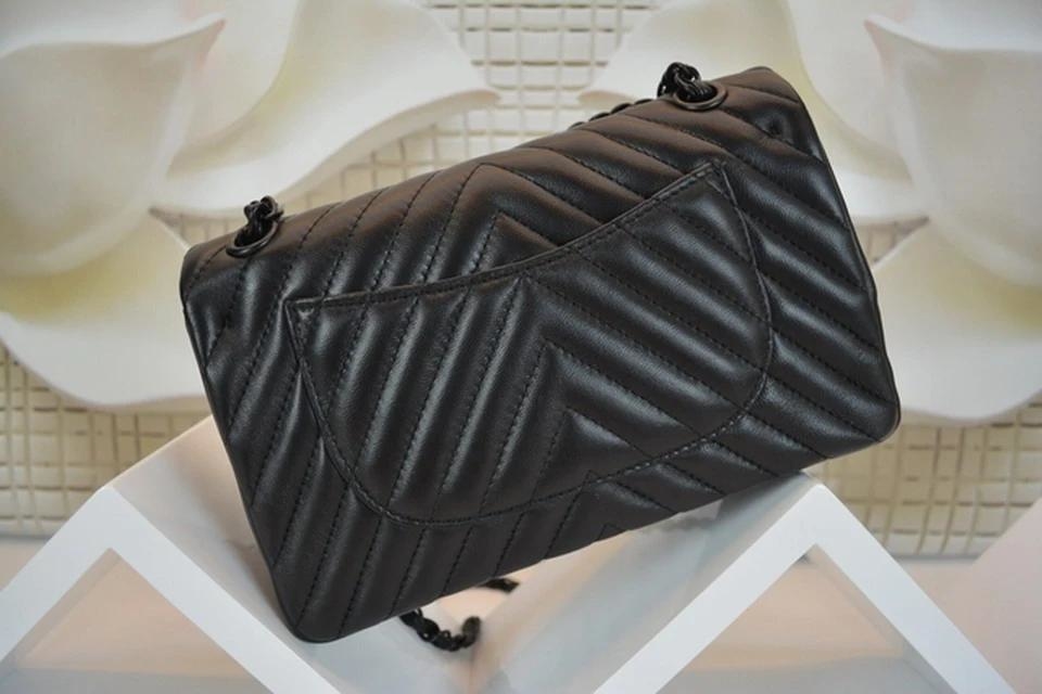 all black chanel flap bolsa