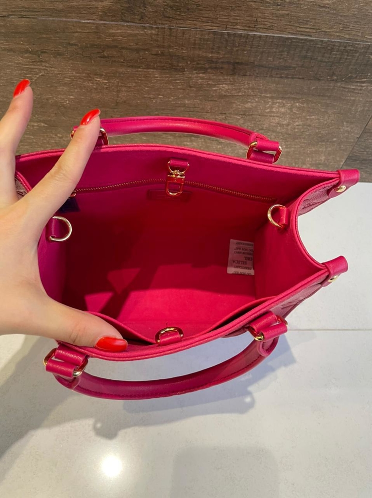 lv bolsa pink inside