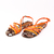 Sandália rasteira com fios diagonais com palmilha cobra