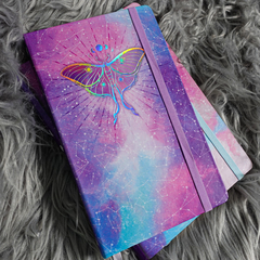 Caderneta Aurora Mariposa Lilás na internet
