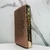 Bolsa Clutch marrom com brilho, com detalhes dourado na internet