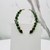 Brinco Ear cuff festa pedrarias verde, cravejado com zircônia folheado a ouro 18k ( Linha premium)
