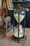 Reloj De Arena Natural Con Soporte Metálico - 1 Hora en internet