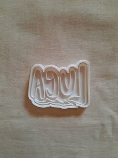 Cortante logo Luca de 9x7cm