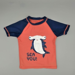 Malla remera Yamp Talle 6 meses coral con mangas azules y estampa See You