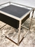 MESA DE LUZ AMALFI CROMADA CON CAJÓN NEGRO en internet