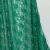 encaje elastizado verde esmeralda